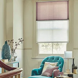 pleated blinds with blue chair